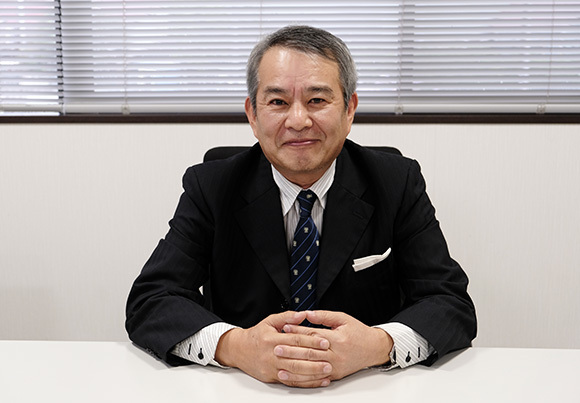 写真：代表取締役社長　吉田 憲司